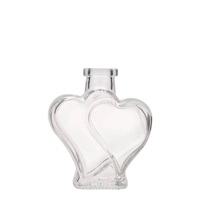 Stiklinis butelis 200ml su širdelėmis skaidrus 10vnt